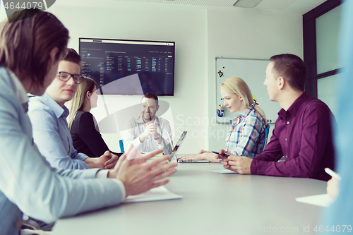 Image of Business Team At A Meeting at modern office building