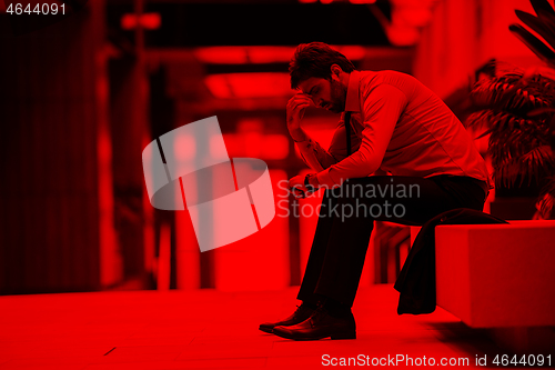 Image of frustrated young business man