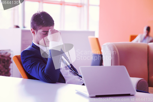 Image of frustrated young business man