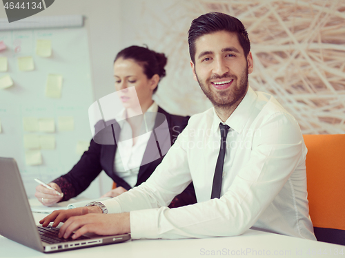 Image of portrait of young modern arab business man  at office