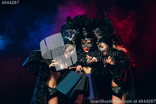 Image of young beautiful dancers posing on studio background