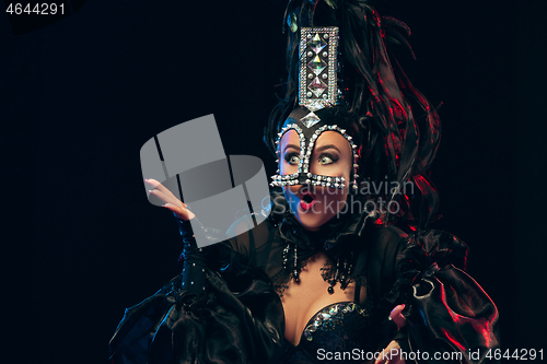 Image of young beautiful dancer posing on studio background