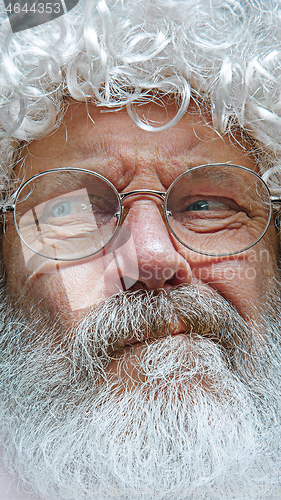 Image of Handsome senior man skeptic and nervous, frowning upset because of problem.