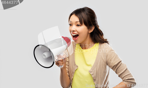 Image of asian woman speaking to megaphone