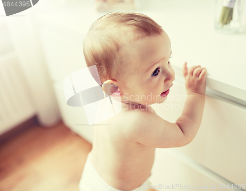 Image of close up of happy little baby boy or girl at home