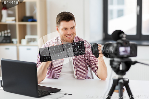 Image of video blogger with keyboard and computer mouse