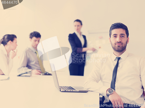 Image of portrait of young modern arab business man  at office