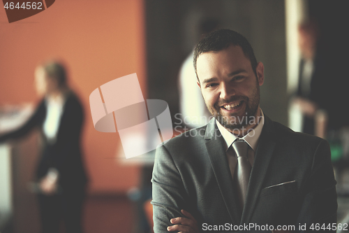 Image of young business man portrait  at modern office