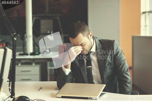 Image of frustrated young business man