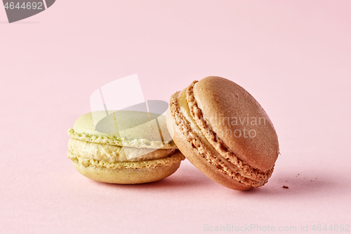 Image of macaroons on pink background