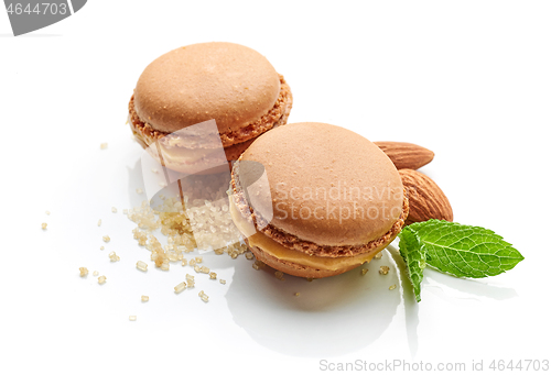 Image of two caramel macaroons