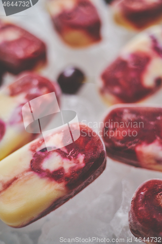 Image of Delicious, homemade popsicles made from cherries and cream.