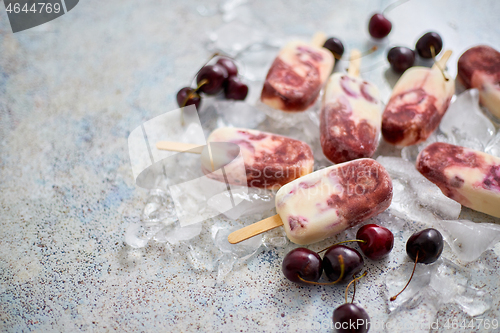 Image of Homemade Delicious Vegan Cherry Popsicles with Coconut Milk. Summer healthy food concept