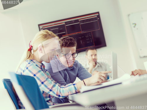 Image of Business Team At A Meeting at modern office building