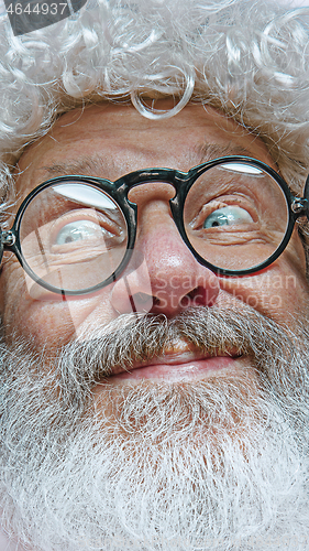 Image of Portrait of happy Santa Claus. Christmas celebration concept.