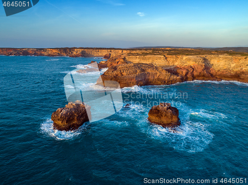 Image of Aerial view on rock cliffs and waves