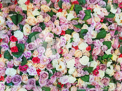 Image of Colorful artificial roses as a seamless background