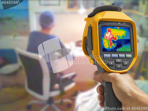 Image of Recording whit Thermal camera, Young Girl using laptop on at hom