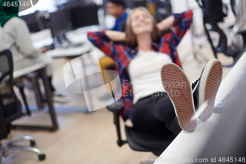 Image of business woman taking a break from work