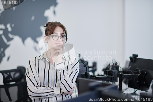 Image of portrait of businesswoman with glasses