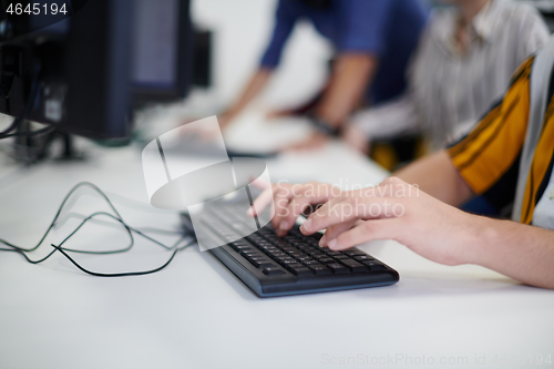 Image of casual business man working on desktop computer