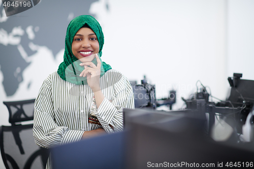 Image of portrait of african muslim business woman at office