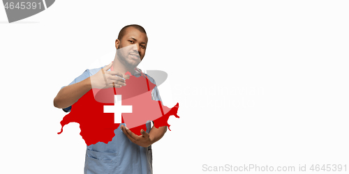 Image of Beautiful african-american doctor cares about Switzerland isolated over white studio background