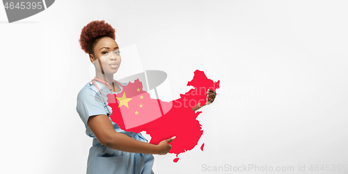 Image of Beautiful african-american doctor cares about China isolated over white studio background