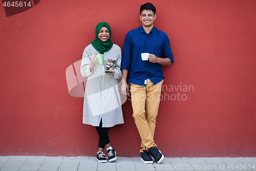 Image of multiethnic group of casual business people during coffee break