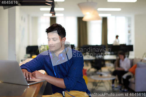 Image of indian business man taking break from the work