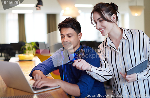 Image of Business people In Relaxation Area Of Modern Office