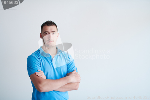 Image of portrait of casual startup businessman wearing a blue T-shirt