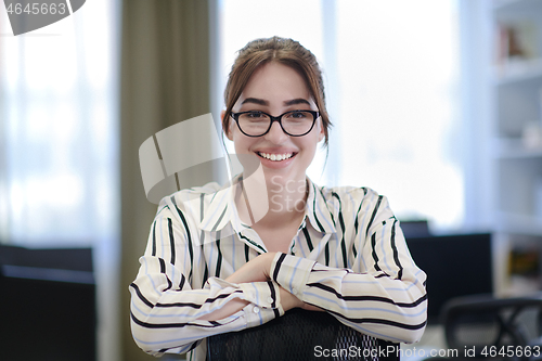 Image of portrait of businesswoman with glasses