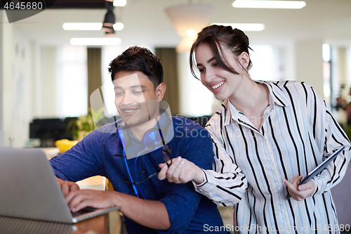 Image of Business people In Relaxation Area Of Modern Office