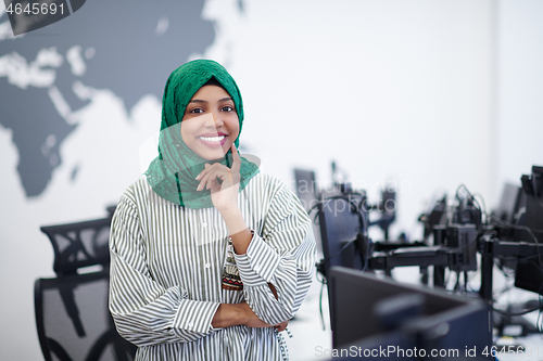 Image of portrait of african muslim business woman at office