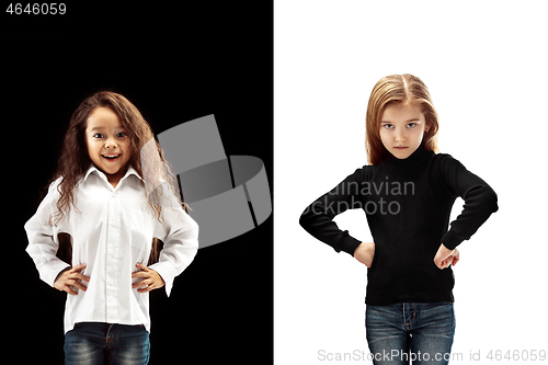 Image of portrait of two emotional girls on a white and black background