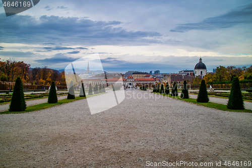 Image of The main walking alley before Unteres Belvedere in Vienna on a background of cloudy sky.