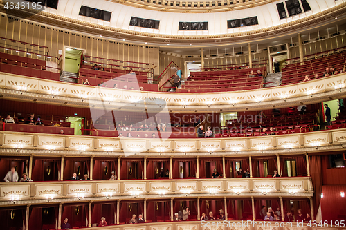 Image of Interior of the Vienna State Opera auditorium with the audience.
