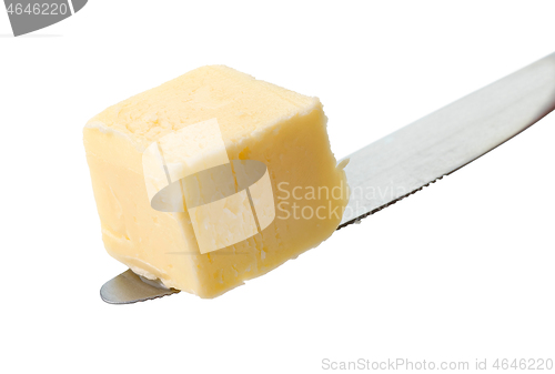 Image of butter cube on knife