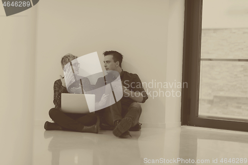 Image of startup business, couple working on laptop computer at office