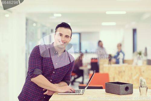 Image of startup business, young  man portrait at modern office