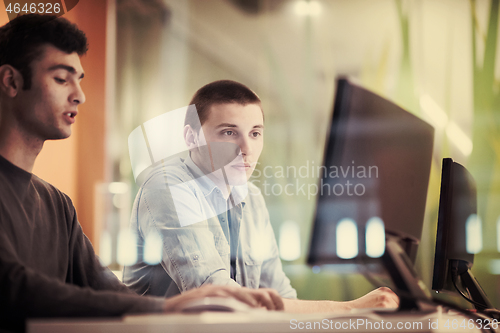 Image of technology students group working  in computer lab school  class