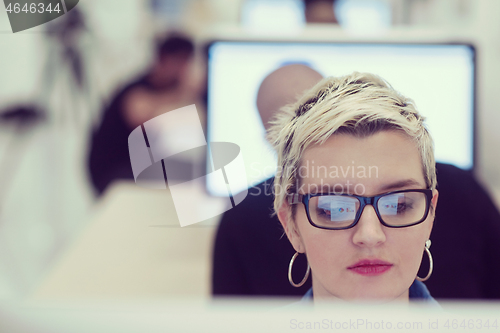 Image of startup business, woman  working on desktop computer