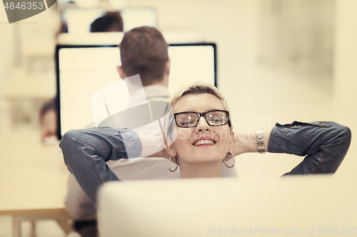 Image of startup business, woman  working on desktop computer