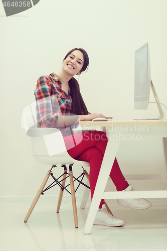 Image of startup business, woman  working on desktop computer