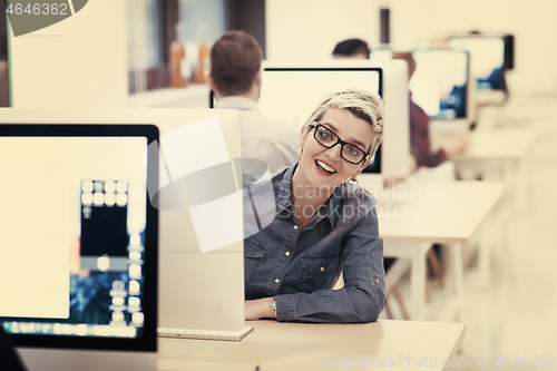 Image of startup business, woman  working on desktop computer