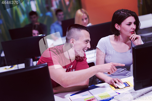 Image of technology students group working  in computer lab school  class