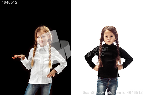 Image of portrait of two emotional girls on a white and black background