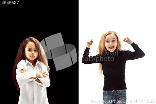 Image of portrait of two emotional girls on a white and black background