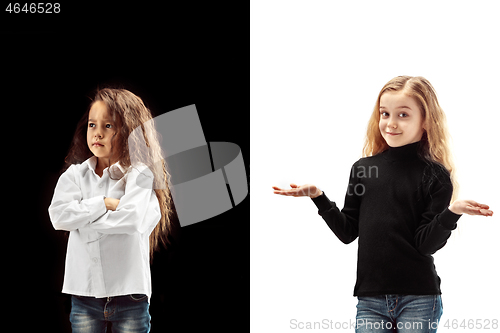 Image of portrait of two emotional girls on a white and black background